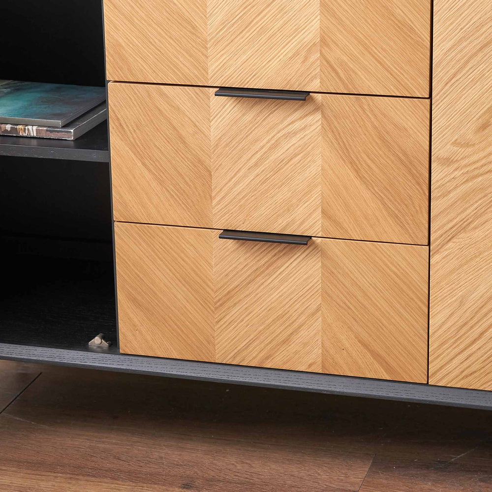 Wooden cabinet with drawers on a wooden floor