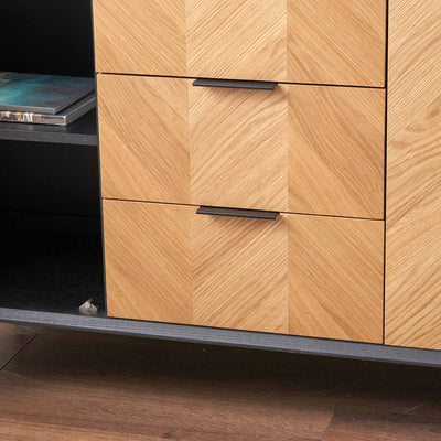 Wooden cabinet with drawers on a wooden floor