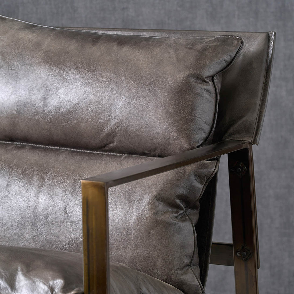 Oliviero Peppercorn Leather Chair and Footstool