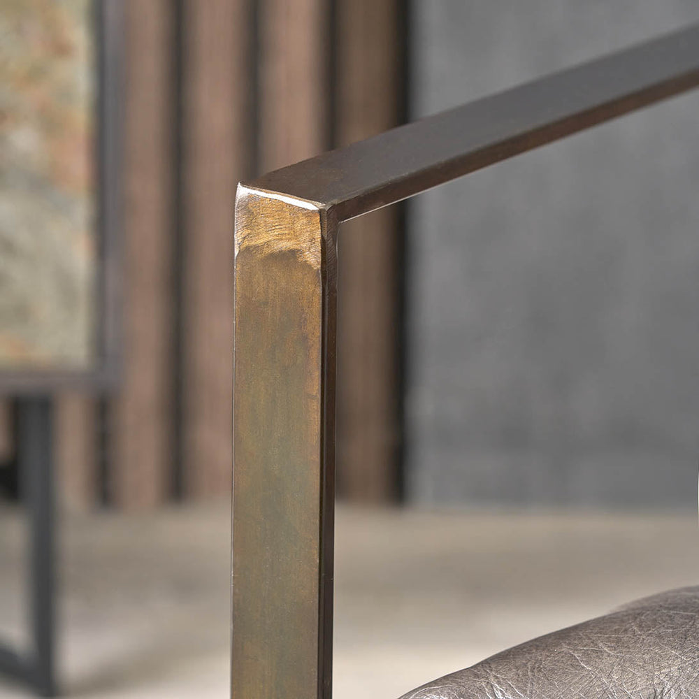 Oliviero Peppercorn Leather Chair and Footstool