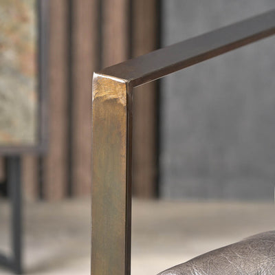 Oliviero Peppercorn Leather Chair and Footstool