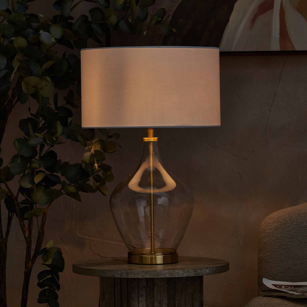 Sorrina Clear Glass and Champagne Gold Bottle Table Lamp