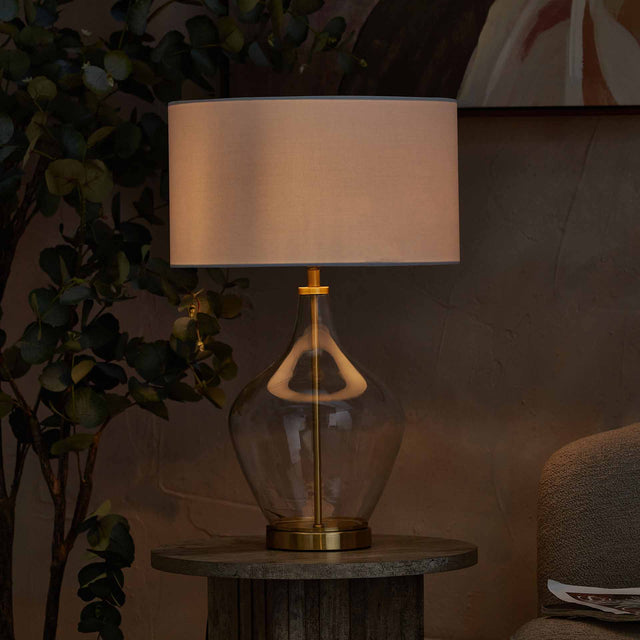 Sorrina Clear Glass and Champagne Gold Bottle Table Lamp