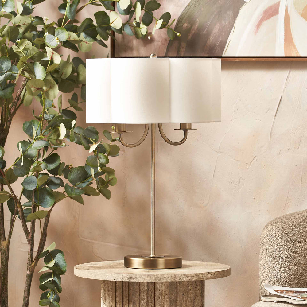 Mariana Matt Antique Brass and White Scallop Shaded Table Lamp