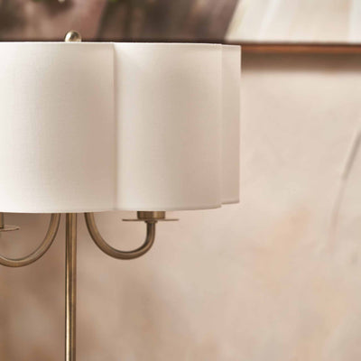 Mariana Matt Antique Brass and White Scallop Shaded Table Lamp