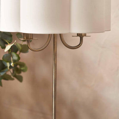 Mariana Matt Antique Brass and White Scallop Shaded Table Lamp