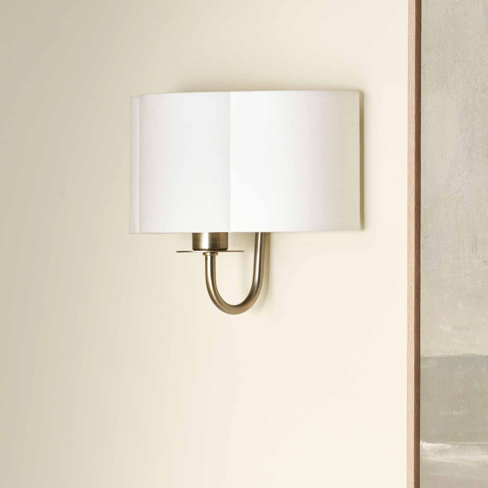 Mariana Matt Antique Brass and White Scallop Shaded Wall Light