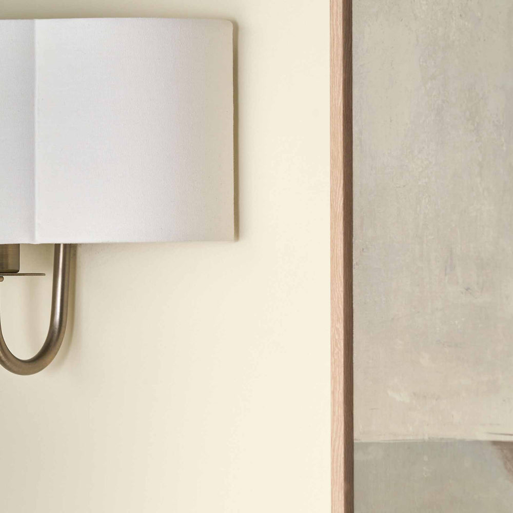 Mariana Matt Antique Brass and White Scallop Shaded Wall Light