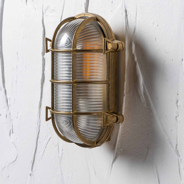 Utah Antique Brass Caged Oval Outdoor Wall Light
